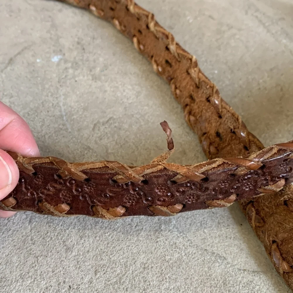 Leather tooled size small belt with wooden buckle